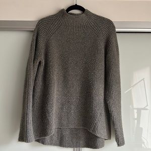 A Madewell sweater in gray.
